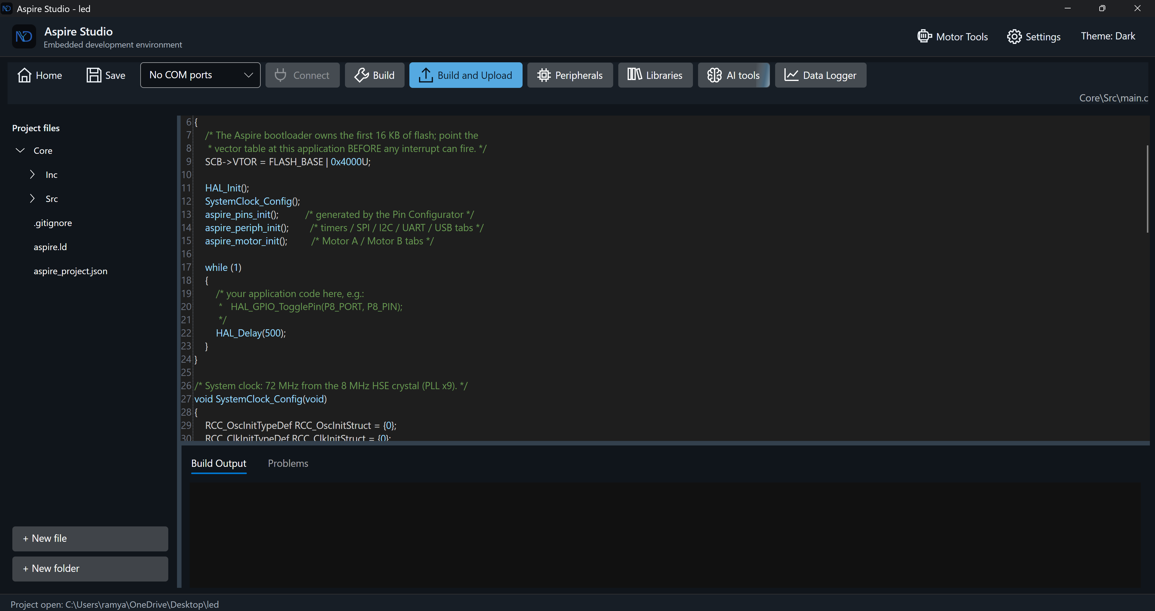 Aspire Studio Main Panel in dark theme showing project files, firmware editor, board connection and build controls, and build output